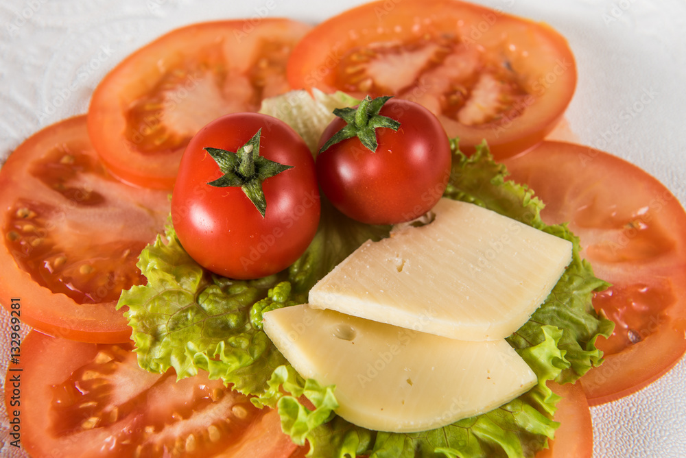 red tomato cheese and green salad