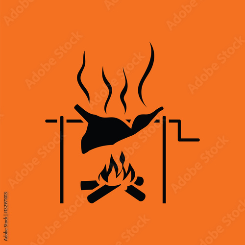 Roasting meat on fire icon