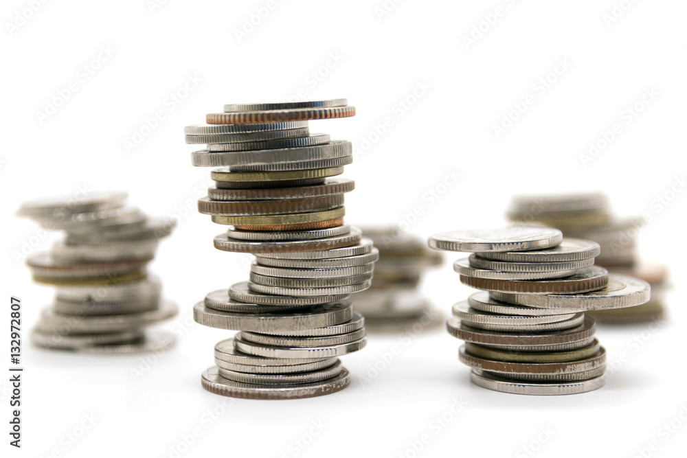 coins stacked on white background coins stacked on white background