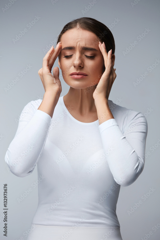 Fototapeta premium Headache. Beautiful Woman Feeling Stress And Strong Head Pain