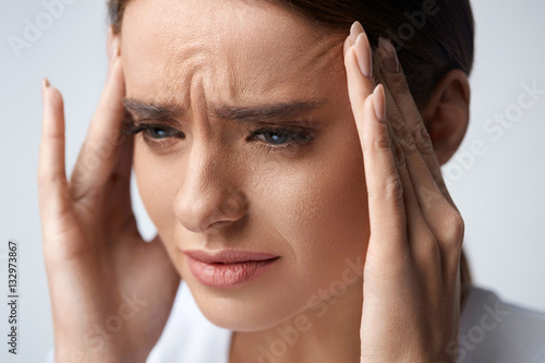 Health. Beautiful Woman Having Strong Headache, Feeling Pain