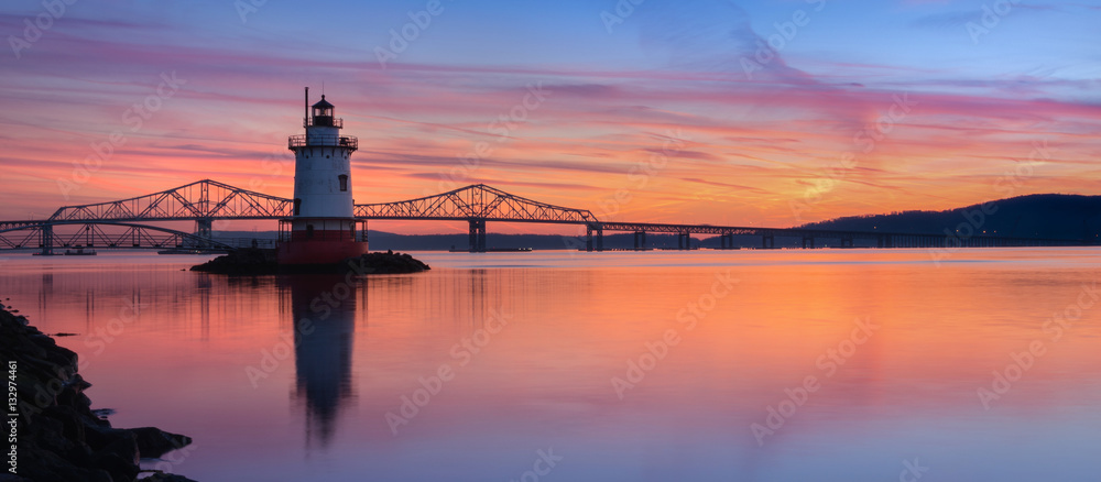Panorama reflections of Tarrytown Lighthouse at sunset 