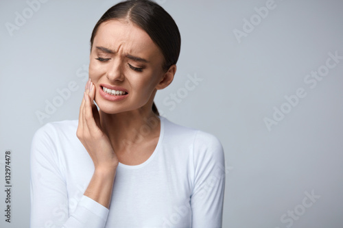 Tooth Pain. Beautiful Woman Feeling Strong Pain, Toothache photo