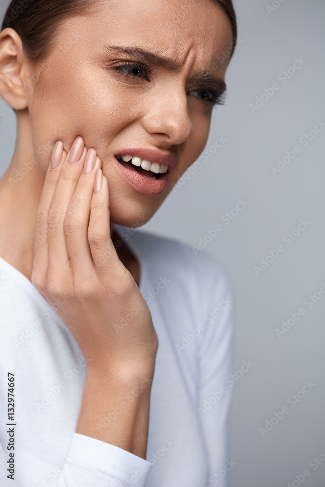 Teeth Pain. Beautiful Woman Suffering From Painful Toothache Teeth Pain. Beautiful Woman Suffering From Painful Toothache