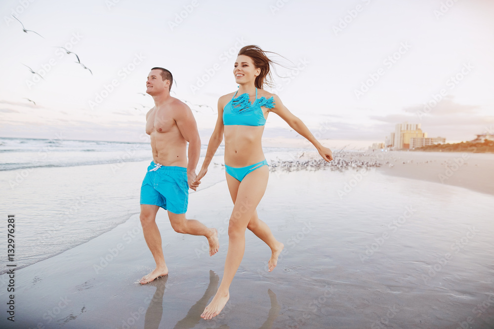 Fototapeta premium beautiful couple on the beach