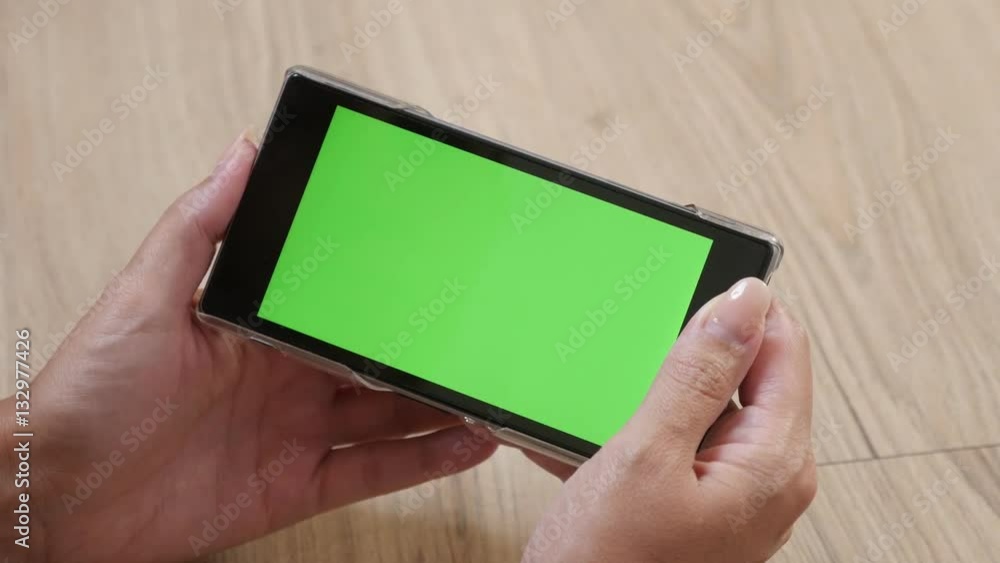 In female hands green screen tablet display 4K 2160p 30fps UltraHD footage - Young woman holds greenscreen smart phone 3840X2160 UHD video In female hands green screen tablet display 4K 2160p 30fps UltraHD footage - Young woman holds greenscreen smart phone 3840X2160 UHD video