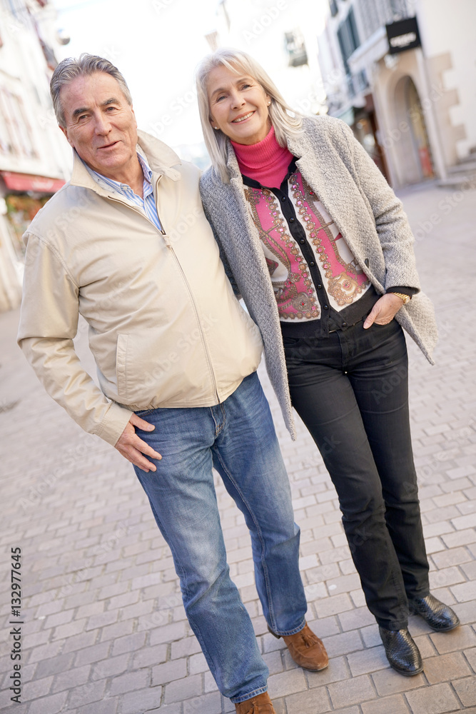 Fototapeta premium Senior couple enjoying journey in town