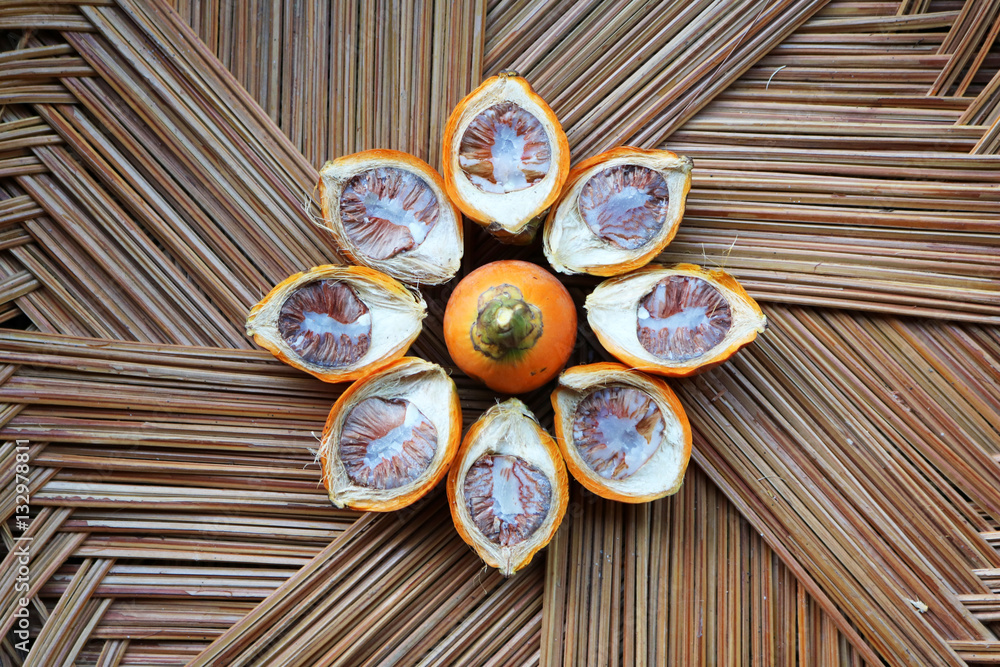 Betel nut in the coconut leaves basket. Betel nut in the coconut leaves basket.