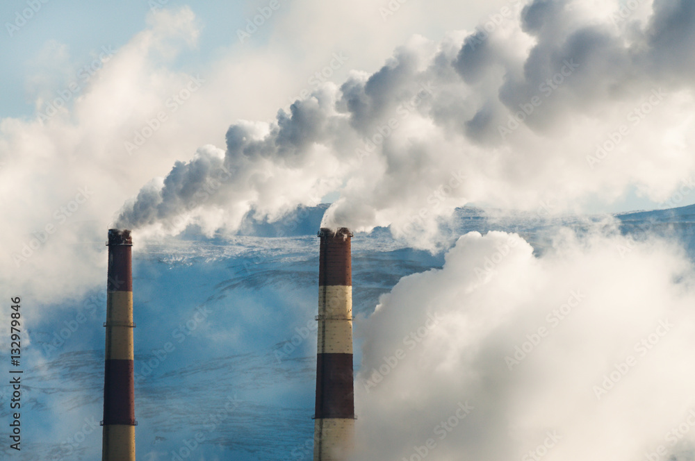 Fuming factory chimney. Fuming factory chimney.