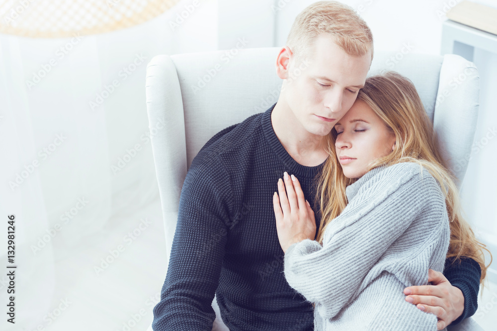 Woman sleeping on man's chest Woman sleeping on man's chest