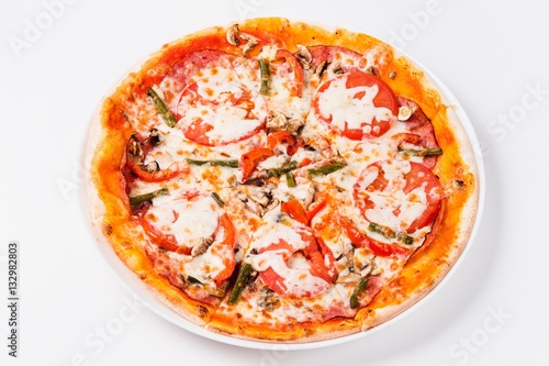 Pizza with tomato  mushrooms  bell peppers closeup