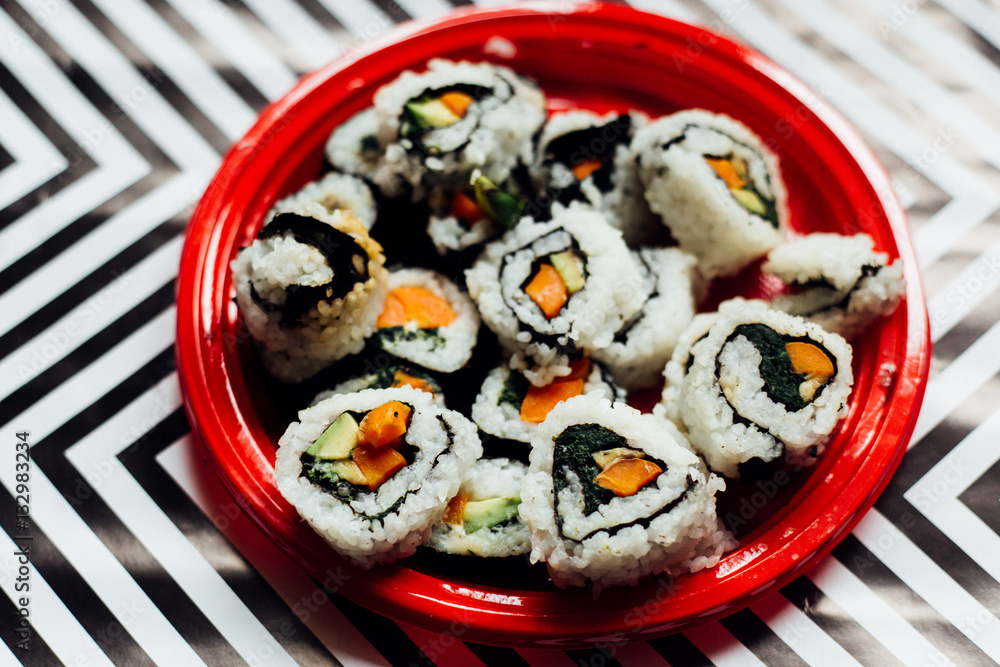 uramaki sushi rolls on trendy background,vegan food on minimal set