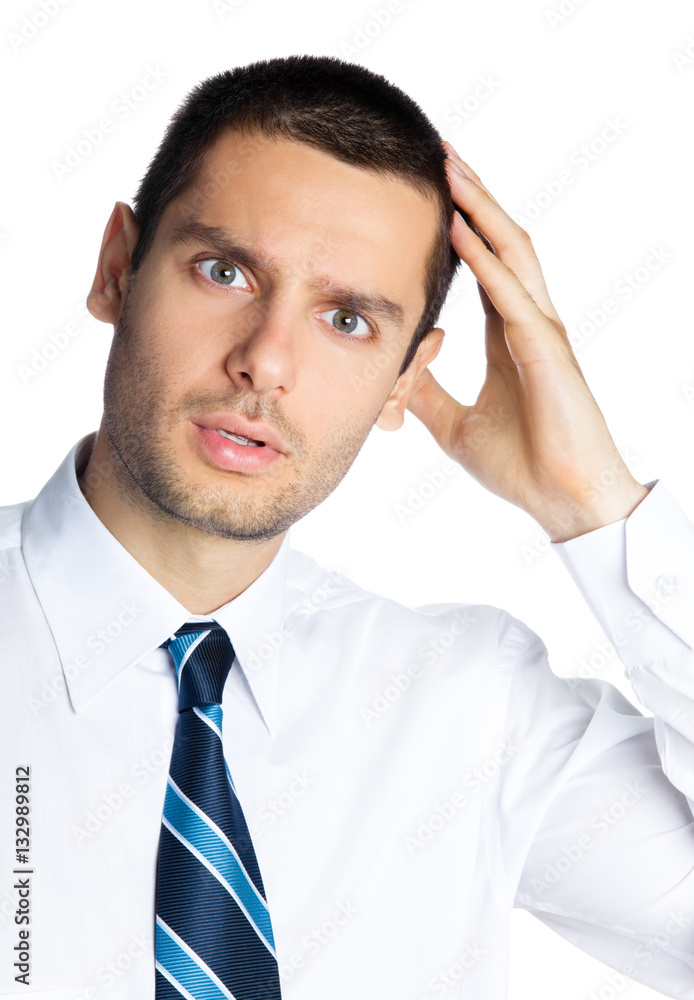 Portrait of puzzled young businessman, isolated on white background. Success in business, job and education concept studio shot. Portrait of puzzled young businessman, isolated on white background. Success in business, job and education concept studio shot.