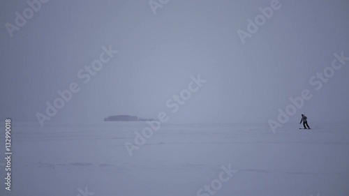 young man on kaytserfin doing tricks with jumping on skis., slow motion photo