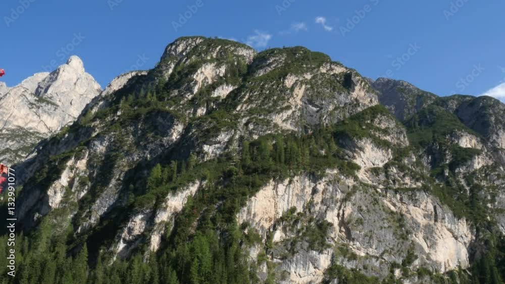 4k UHD autumn mountain over lake prags in the dolomite alps with a colorful tree. Pan - tilt shot 11513
4k UHD autumn mountain over lake prags in the dolomite alps with a colorful tree. Pan - tilt shot 11513