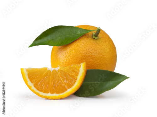 Orange and slice on white background photo