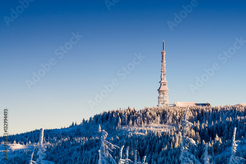 Fototapeta Naklejka Na Ścianę i Meble -  Radio tower in winter scenery