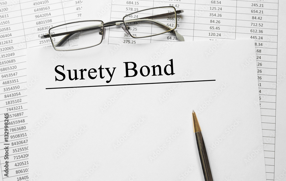 Paper with Surety Bond on a table Paper with Surety Bond on a table