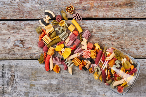 Many multi-colored pasta of different shapes.