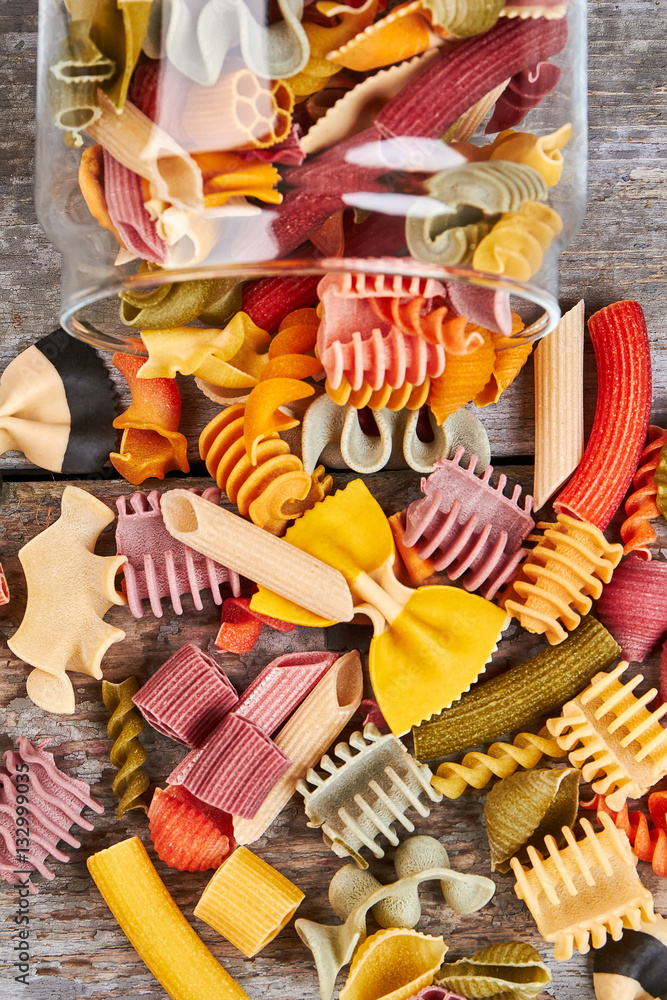 Delicious Italian pasta in different shapes and colors.