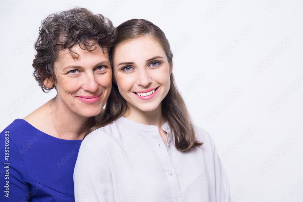 Portrait of happy senior woman and young daughter Portrait of happy senior woman and young daughter