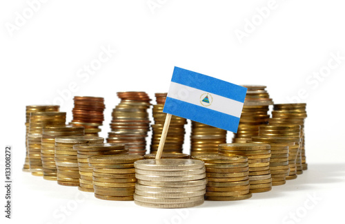 Canvastavla Nicaragua flag waving with stack of money coins