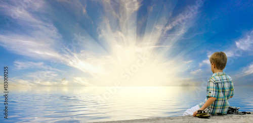Boy Alone on a Dock
