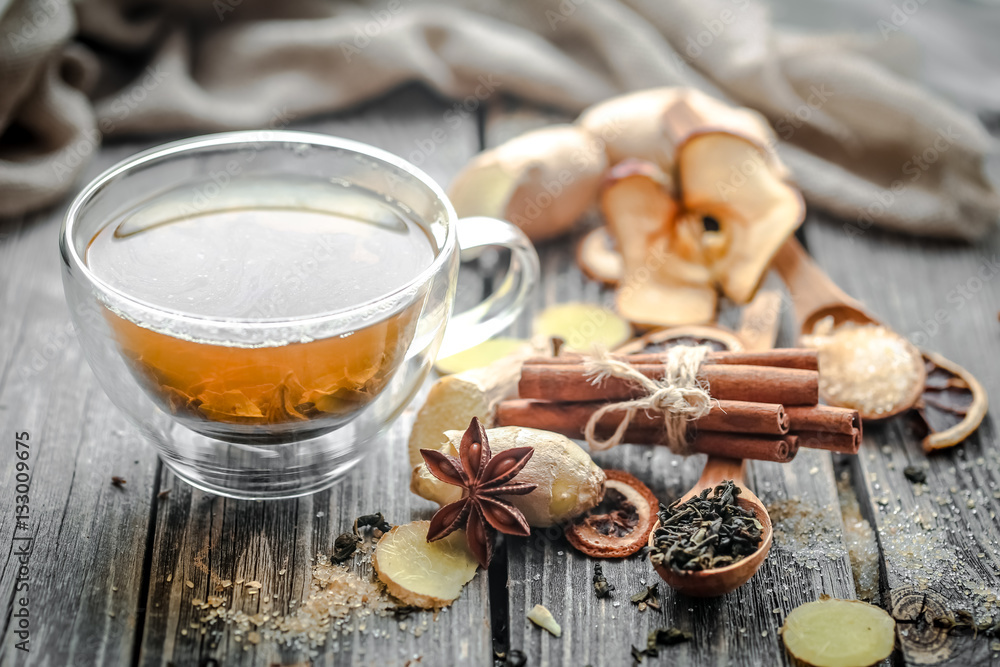 still life with transparent Cup of tea on wooden background still life with transparent Cup of tea on wooden background