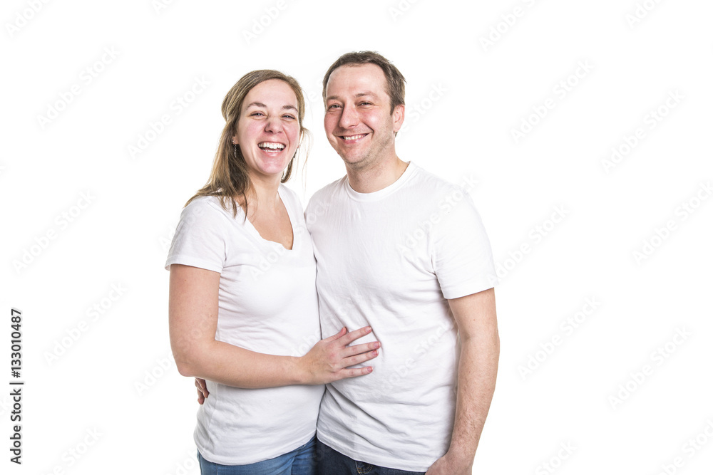 A happy couple isolated on white background. Attractive man and woman being playful. A happy couple isolated on white background. Attractive man and woman being playful.