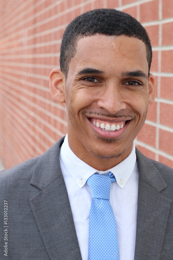 Close-up of smiling young, dark-skinned businessman Close-up of smiling young, dark-skinned businessman