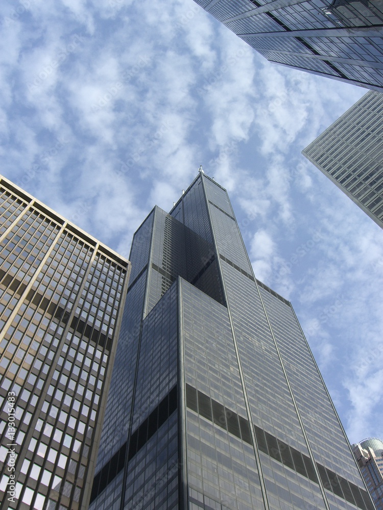 Tall Chicago downtown skyscrapers ascending towards sky