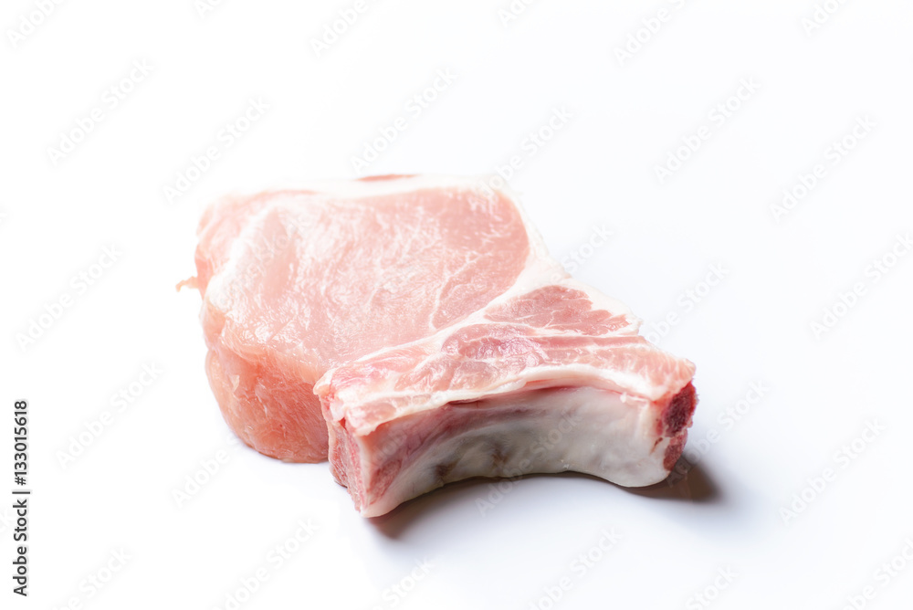 Fresh raw beef steak isolated on white.. Fresh raw beef steak isolated on white..