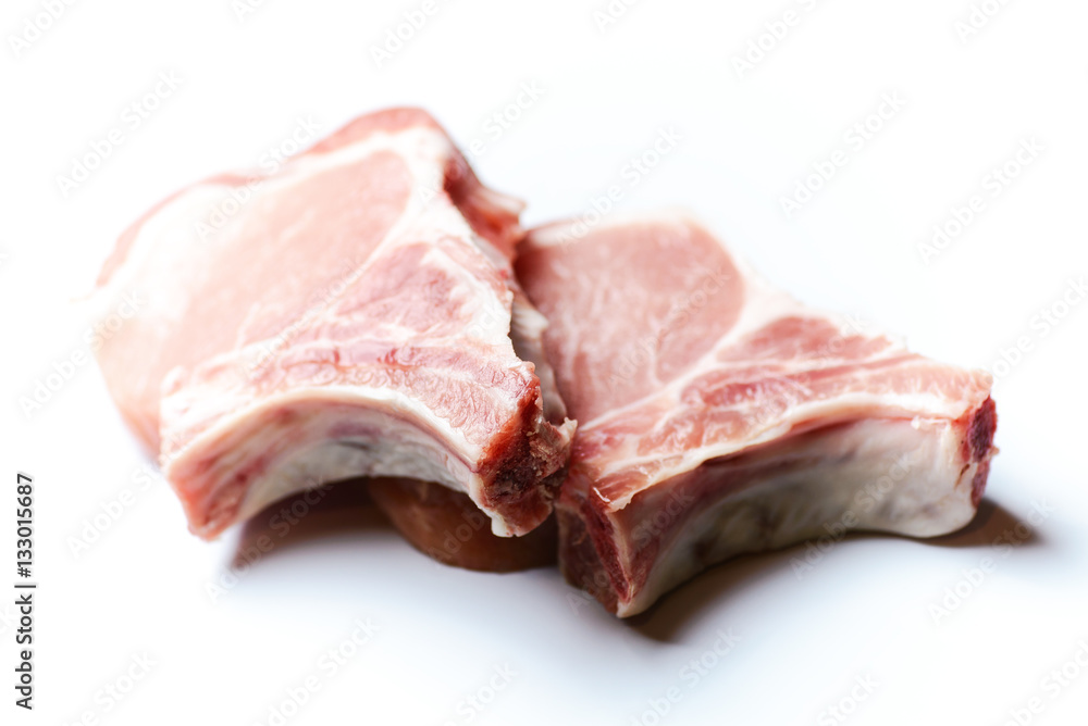 Fresh raw beef steak isolated on white..