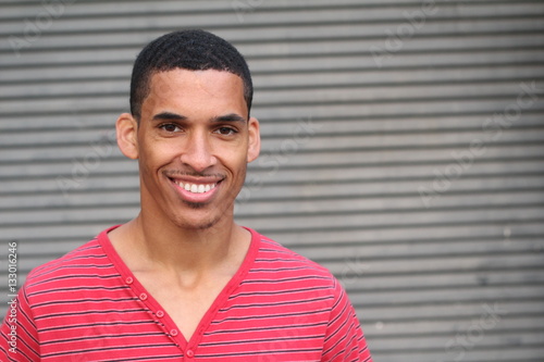 Natural young man smiling close up