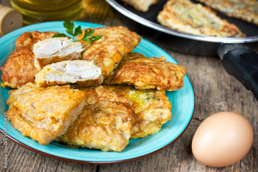 Fish fillet fried in egg batter Fish fillet fried in egg batter