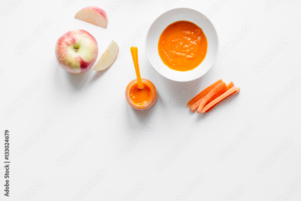 cooking vegetable puree for baby on white background top view cooking vegetable puree for baby on white background top view