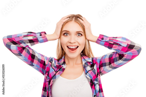 Unbeliveable! Happy cheerful surprised woman touching head photo