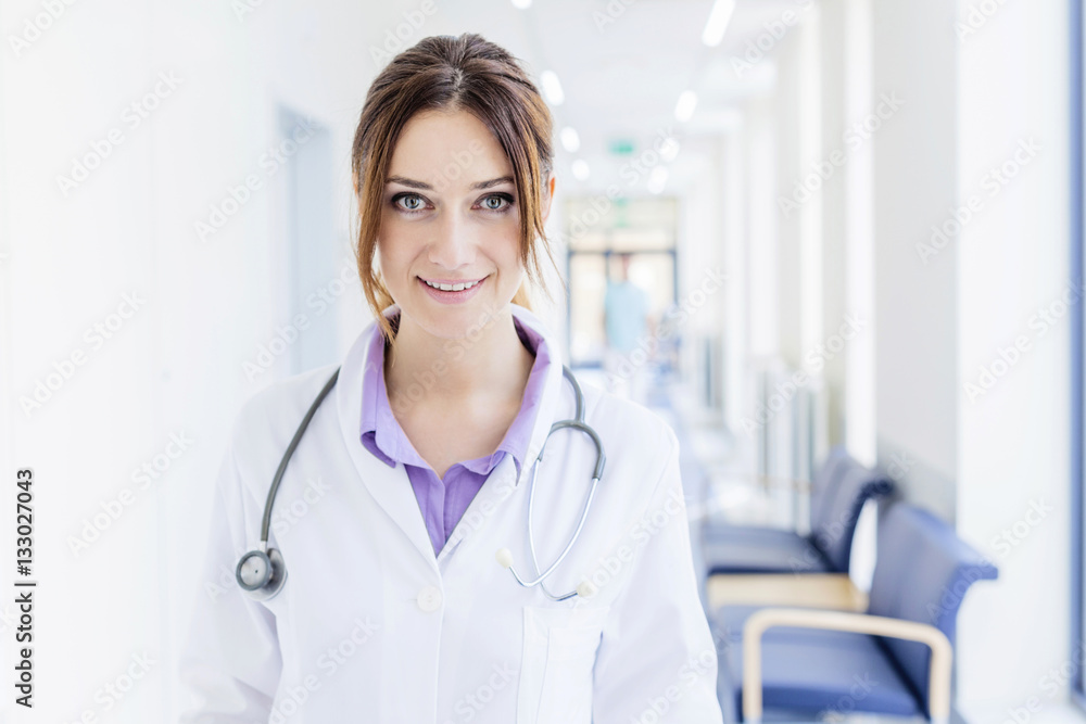 Portrait of female doctor standing in hospital Portrait of female doctor standing in hospital