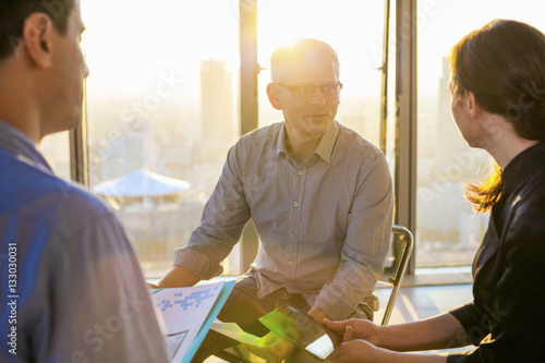 Meeting of architects and business people in modern office