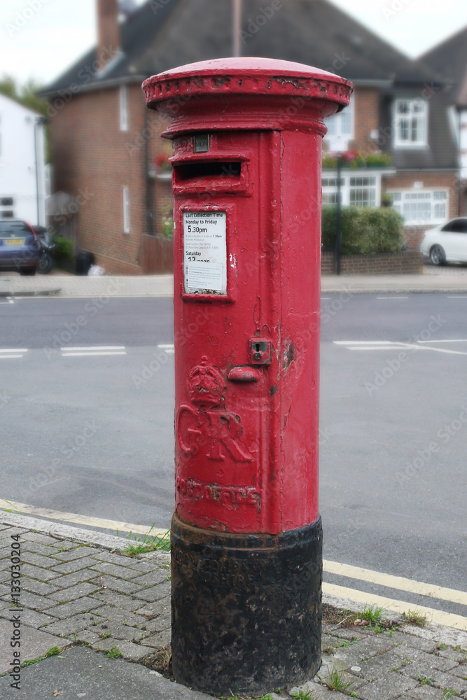 Red pillar post box, London, UK. King George Red pillar post box, London, UK. King George