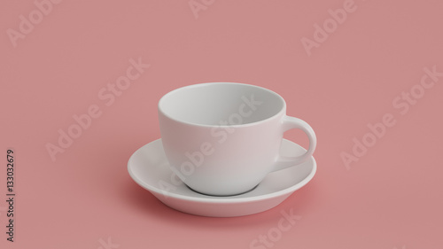 Tasse mit Untertasse vor rosa Hintergrund