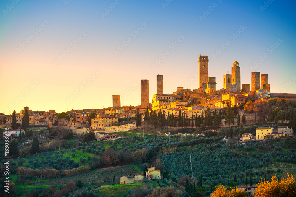 San Gimignano town skyline and medieval towers sunset. Tuscany,