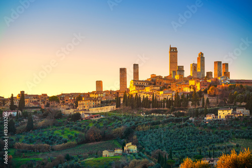 San Gimignano town skyline and medieval towers sunset. Tuscany, photo