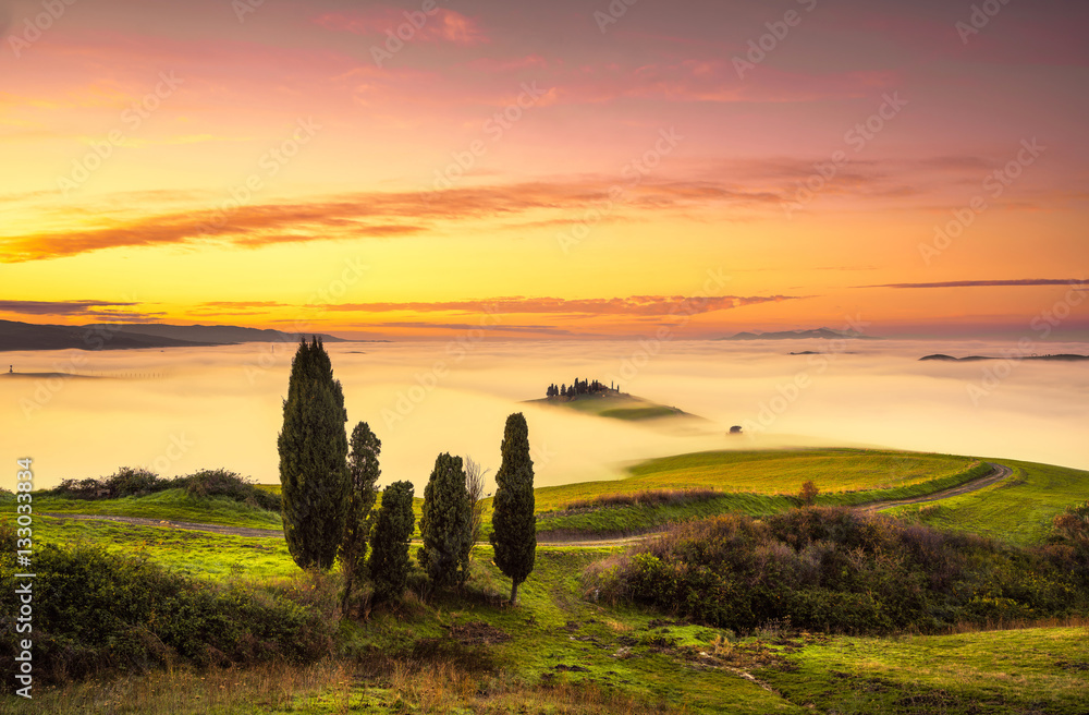 Volterra fog and sea of clouds panorama. Tuscany, Italy