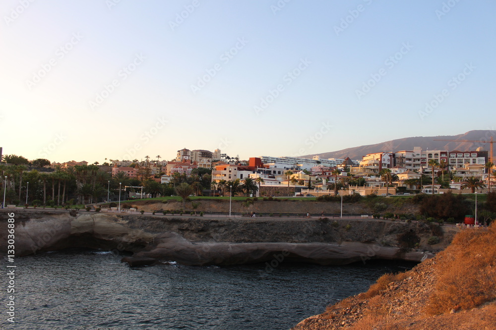 Photograph shows an amazing view of the undermined cliff, playa de Fanabe, Tenerife, Spain, September 2016