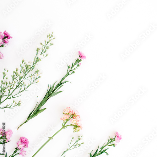 Colorful wildflowers on white background. Flat lay  top view. Valentine s background