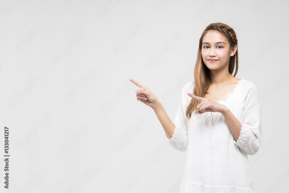 young latina girl pointing to the left young latina girl pointing to the left