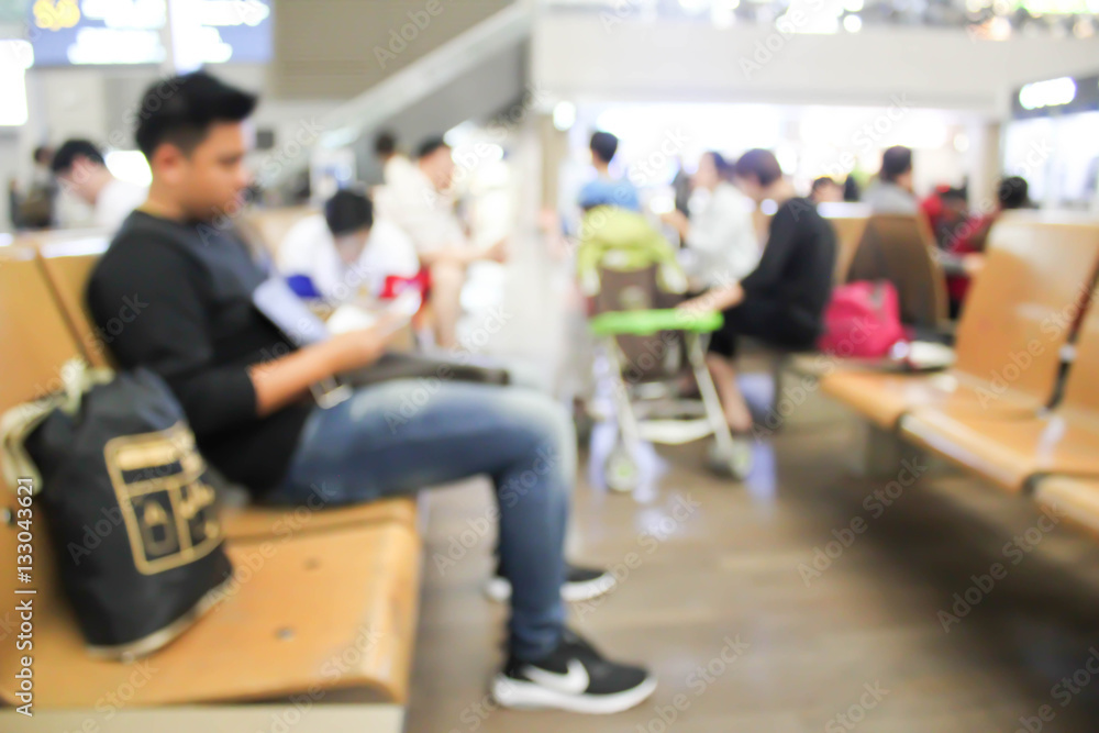 blurred people walking at the airport or business hall blurred people walking at the airport or business hall