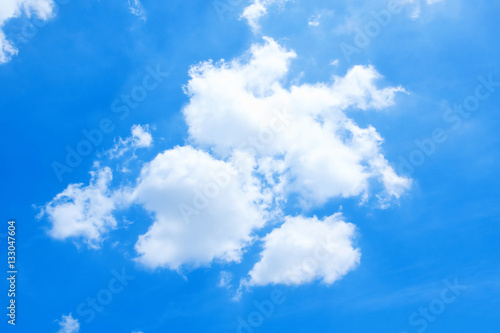 Puffy Clouds background in the sky
