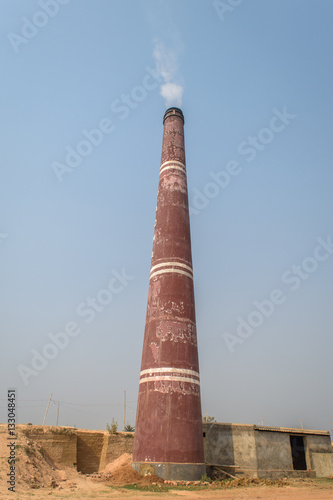 Chimey of a brick making machine. photo